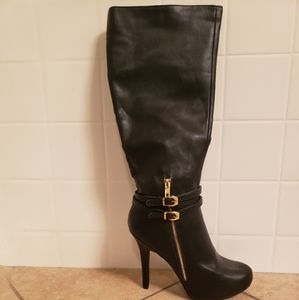 Black with gold zipper on side high heel boots